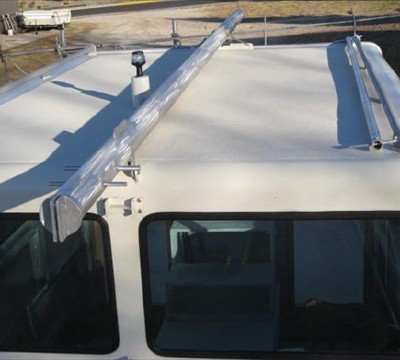 mast folded down, hand-rails each side