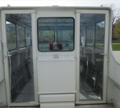 double door entrance to cabin, fuel tank between doors