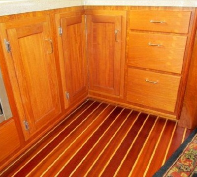 beautiful teak & holly sole in galley/salon