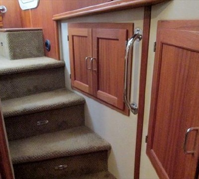 steps down to forward stateroom with useful storage