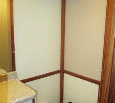towel bars, vacu-flush head, storage under vanity