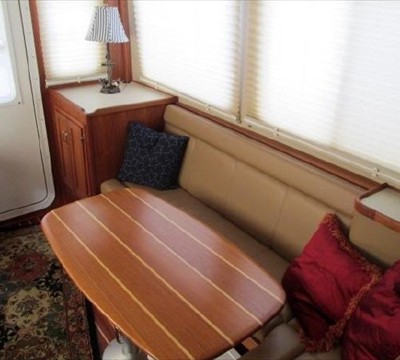 salon settee converts to large berth, hi-lo teak pedestal table