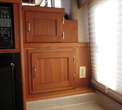 extra custom-built cabinet next to microwave