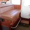 port side settee in pilothouse with storage under