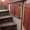 steps down to forward stateroom with useful storage