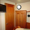 storage port side, door to pilothouse, mounted TV