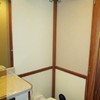 towel bars, vacu-flush head, storage under vanity