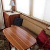 salon settee converts to large berth, hi-lo teak pedestal table