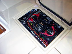 Battery access port aft cockpit 