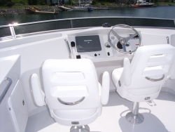 Dual captain's chairs at helm