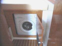 Washer / dryer under guest berth
