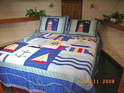 Queen island bed in master stateroom