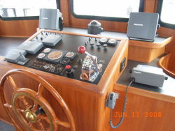 Teak wheel at helm