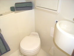 Vanity and vacuflush toilet